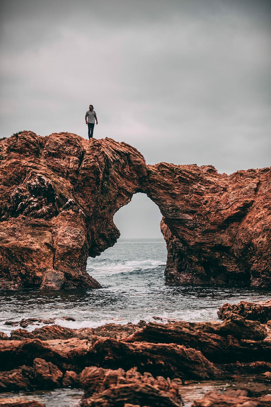 landscape photography of man standing on top of mountain hill, untitled HD wallpaper