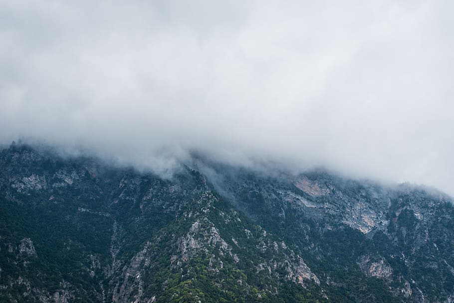 grass covered mountains under white cloudy sky, clouds above mountains HD wallpaper