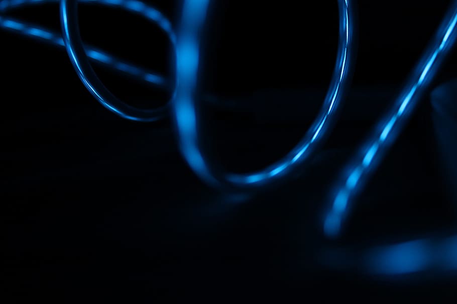 Blue light reflected in the surface of glossy swirling wires, untitled HD wallpaper