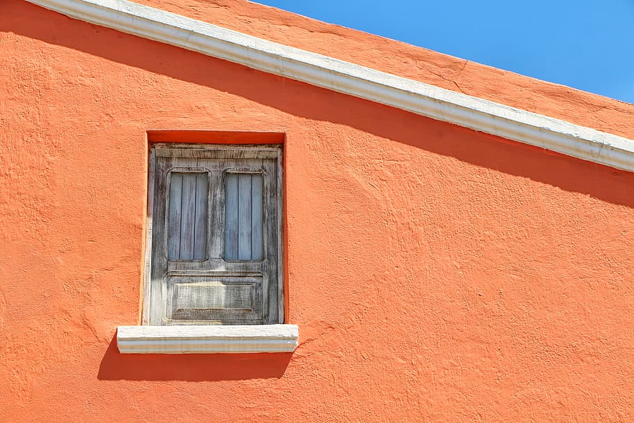 selective focus of close window at daytime, orange house with gray wooden window HD wallpaper