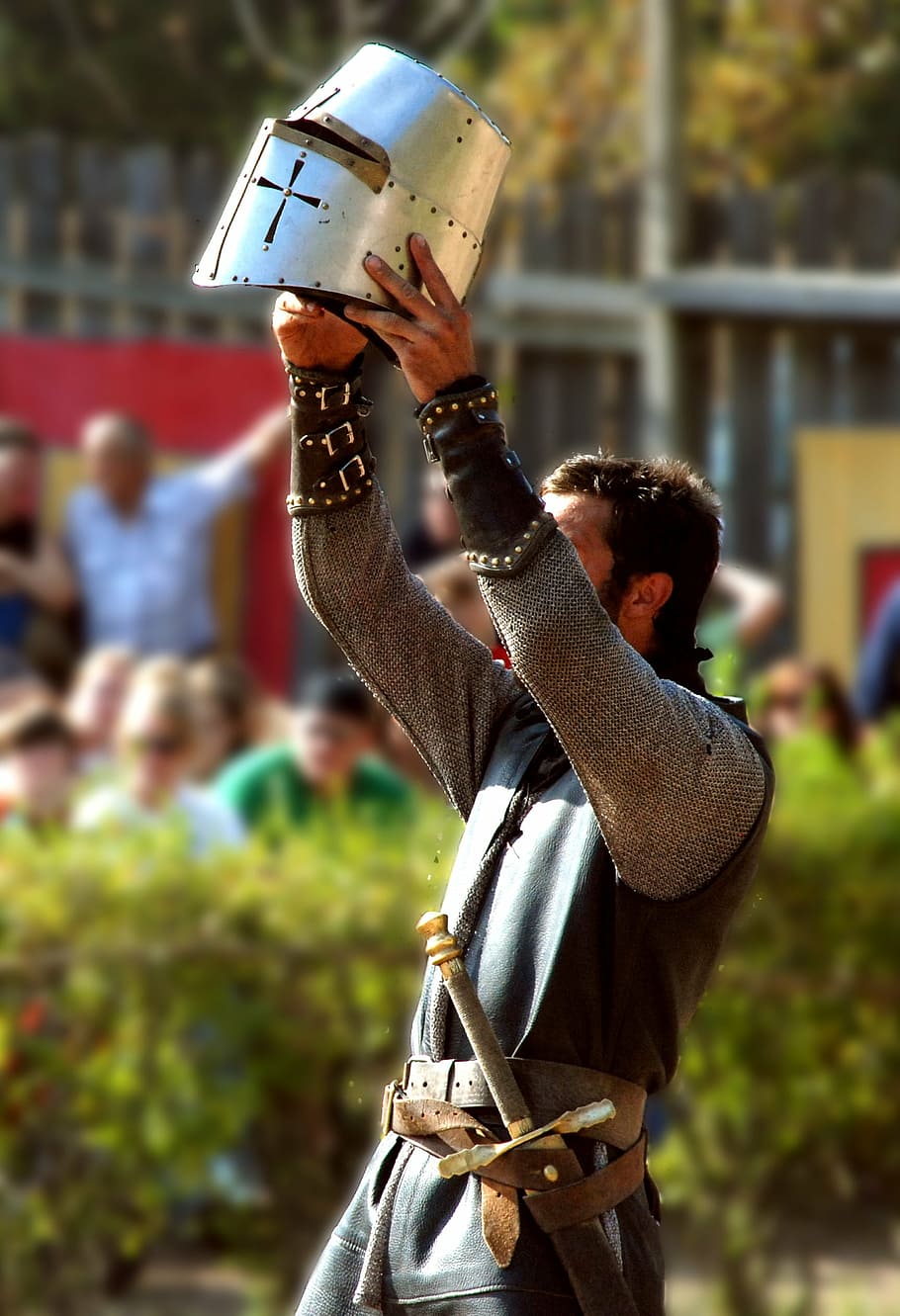person wearing medieval soldier costume, knight, helmet, armor