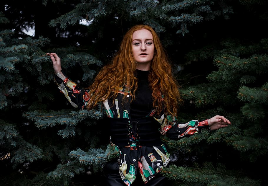 woman in black long-sleeved top beside trees, woman in black and green long-sleeved top surrounded by trees HD wallpaper