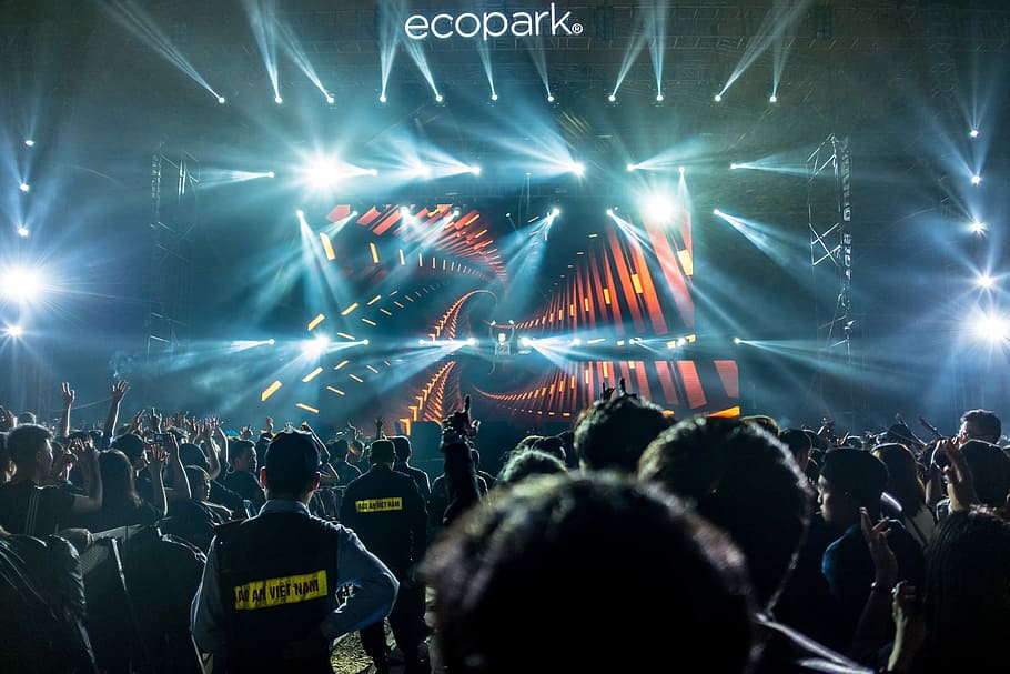 people standing in front of Eco Park stage, people gathered on concert