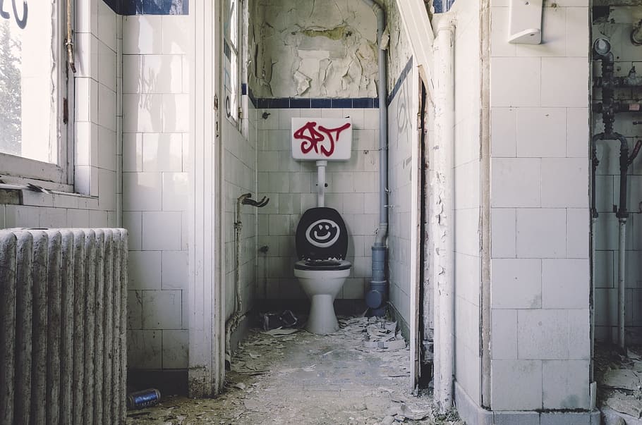 white and black toilet bowl, bathroom, dilapidated, disrepair