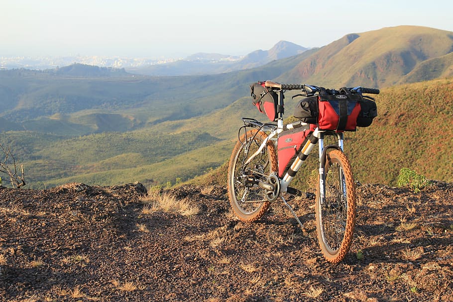 bicycle parked on dirt, bike packing northpak, cycle tourism