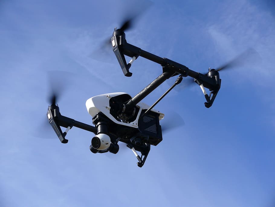 black and white quadcopter drone under cloudy blue sky, multicopter HD wallpaper