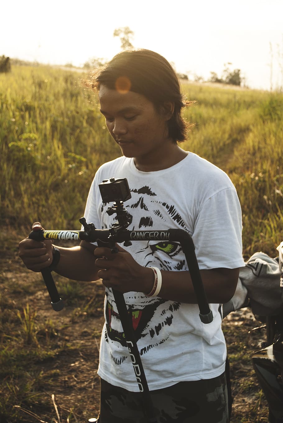 Man With White Black Shirt in Field, camera, gadgets, go pro HD wallpaper