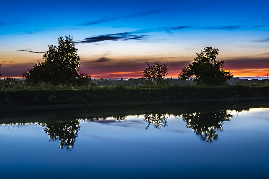photo of green field near lake, river, mirroring, water, reflections HD wallpaper