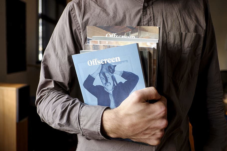 person holding books, person holding several books, Stack, Offscreen HD wallpaper