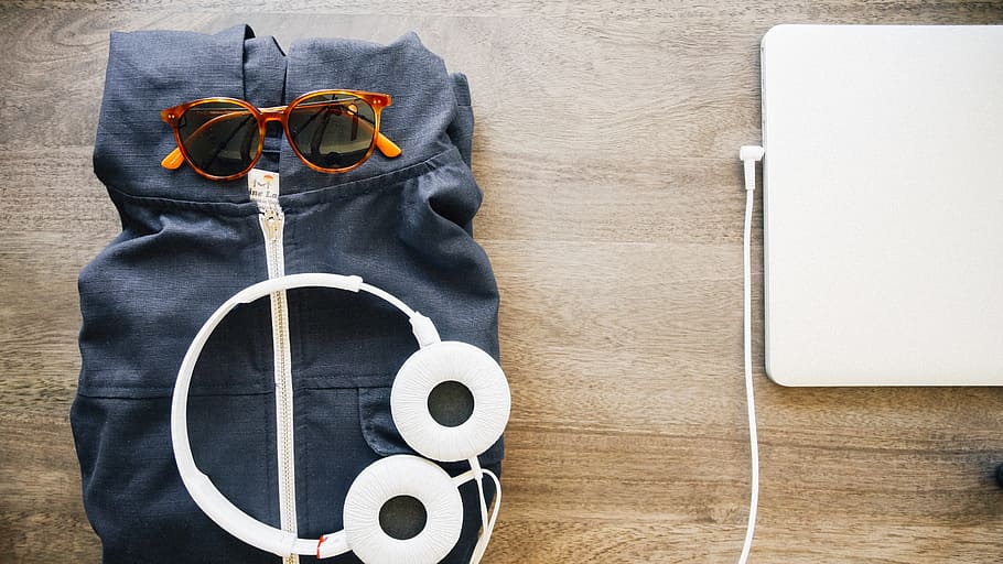 white corded headphones on black textile, earphones, laptop HD wallpaper