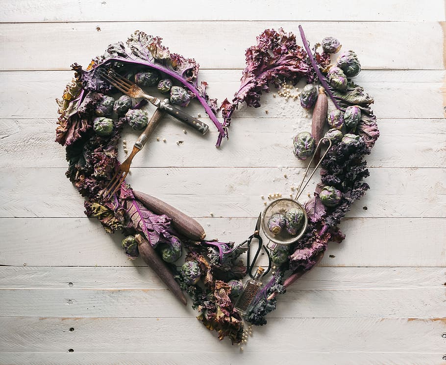 top view of leaves and assorted items formed into heart, flat lay photography of dried vegetables forming heart shape HD wallpaper