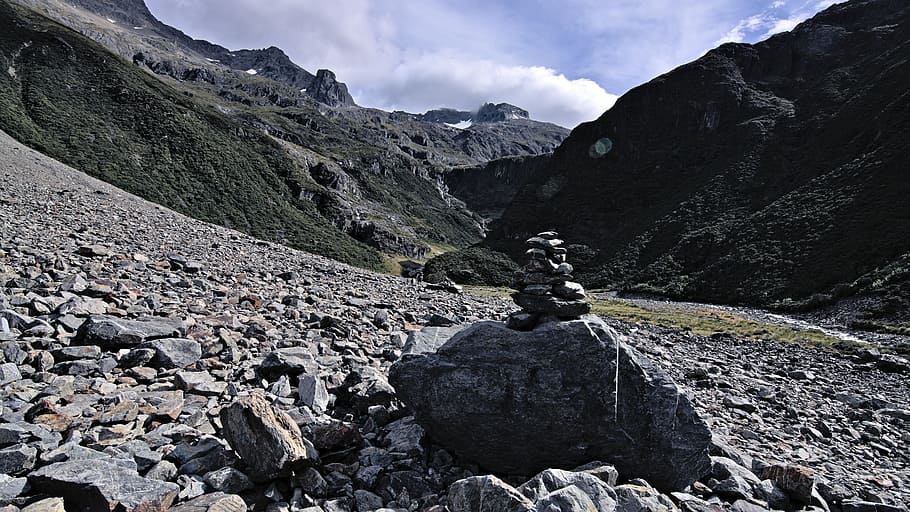 mountain, highland, rocks, grass, adventure, clouds, sky, landscape HD wallpaper
