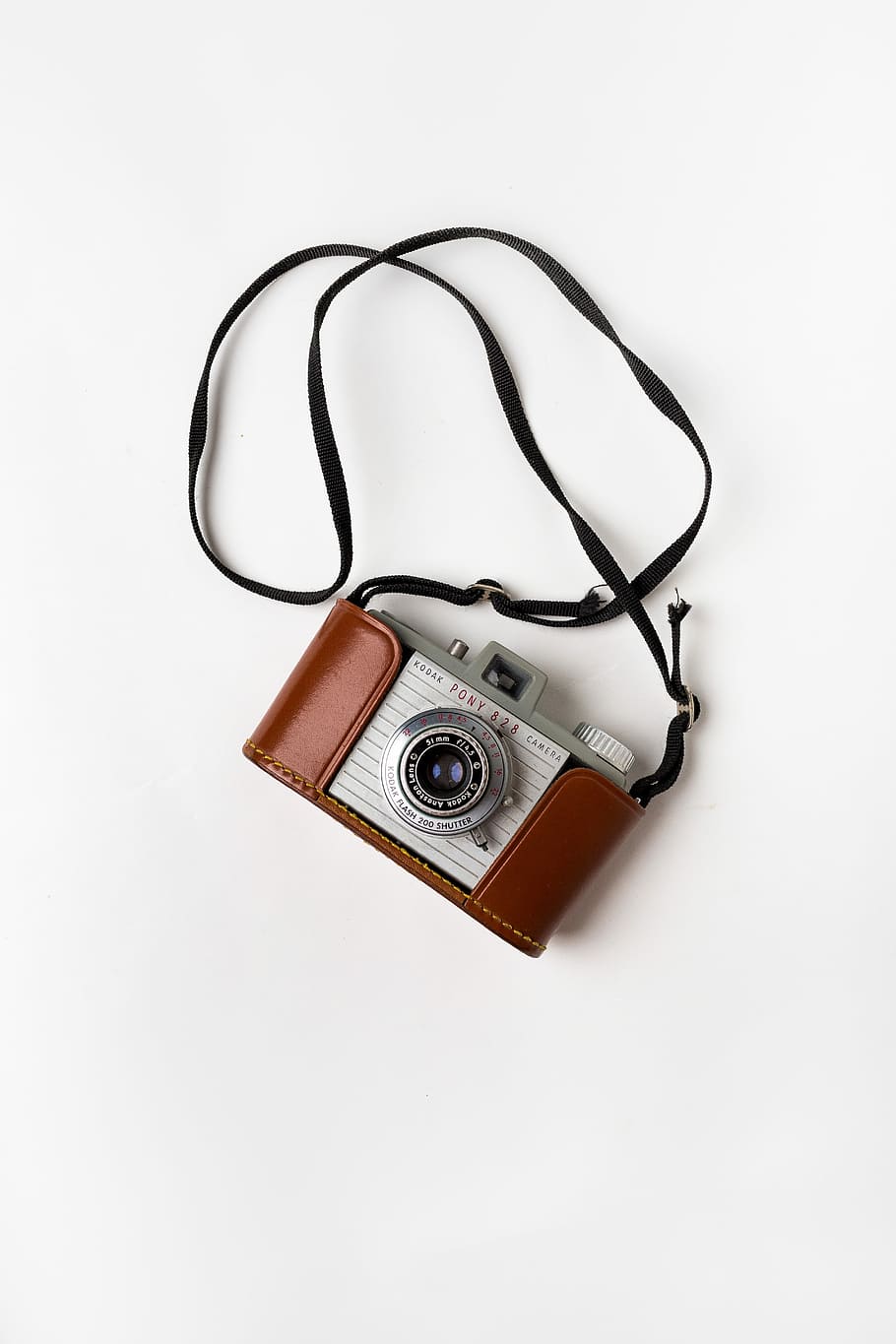 brown and gray SLR camera on white surface, white and black DSLR camera HD wallpaper