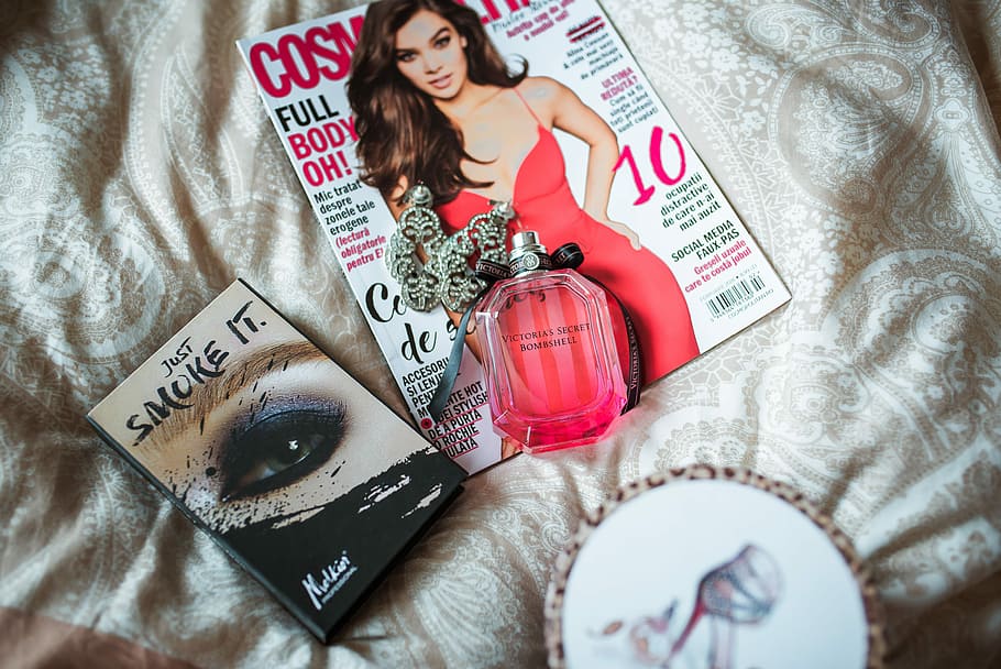 Cosmopolitan magazine on white textile, Cosmopolitan magazine with fragrance bottle on gray cloth, HD wallpaper