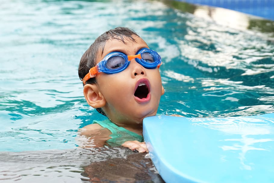 person, water, blue, blur, active, child, close -up, goggles HD wallpaper