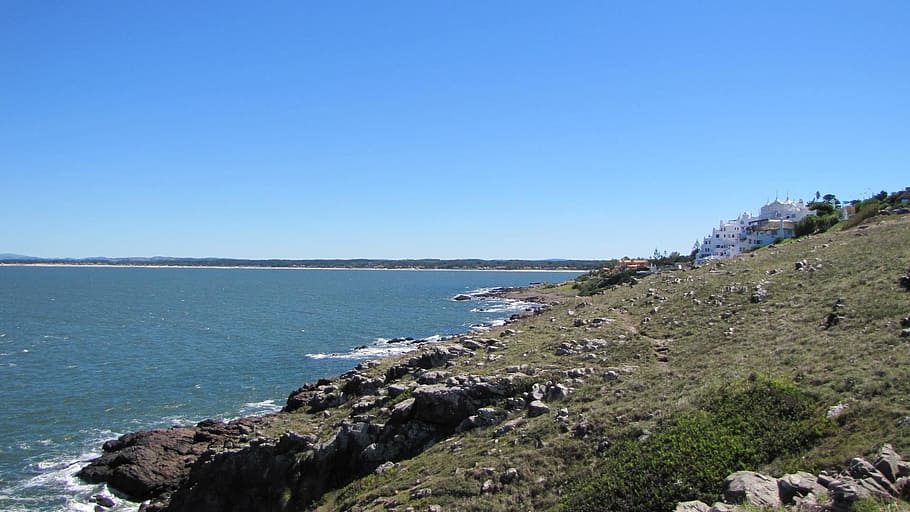 uruguay, beach, rocks, landscape, horizon, sky, ocean, clouds HD wallpaper