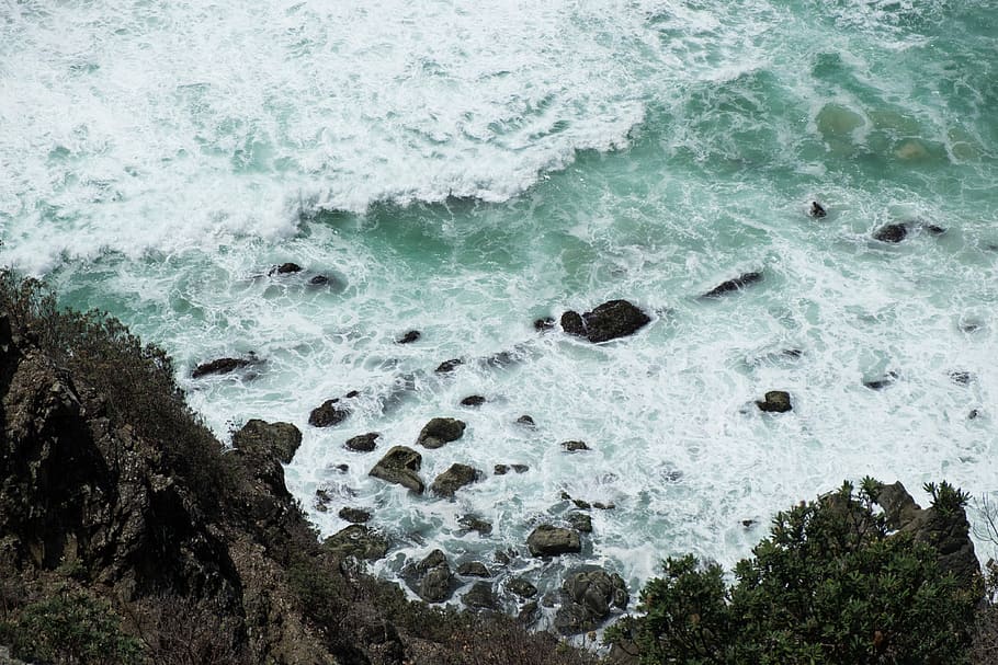 Byron Bay, sea waves on rock, aerial view, drone, from above