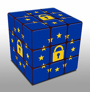 blue and yellow 3x3 Rubik's cube on white surface, europe, gdpr HD wallpaper
