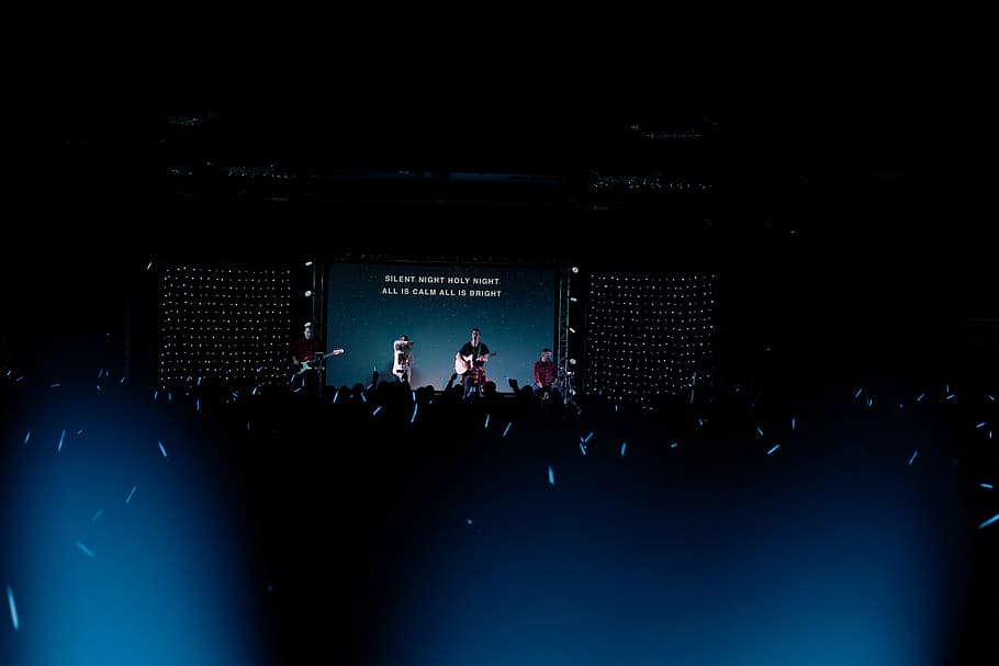 person took a photon in a concert, rock band performing on stage HD wallpaper