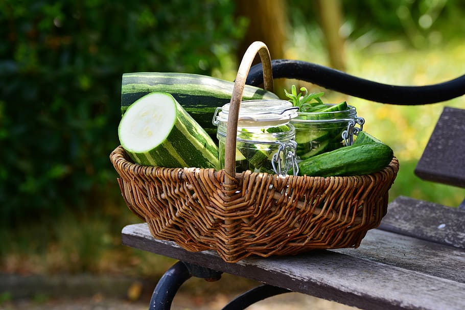 sliced cucumbers on brown wicker basket, Zucchini, Vegetables HD wallpaper