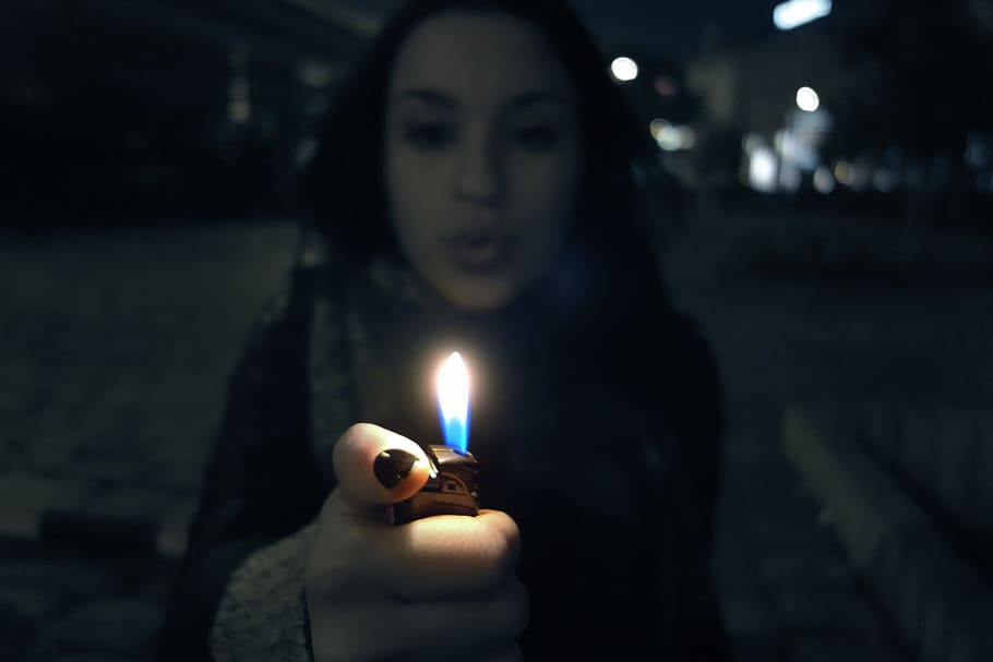 woman holding lighter, person, melancholy, mourning, dark, flash of light, HD wallpaper