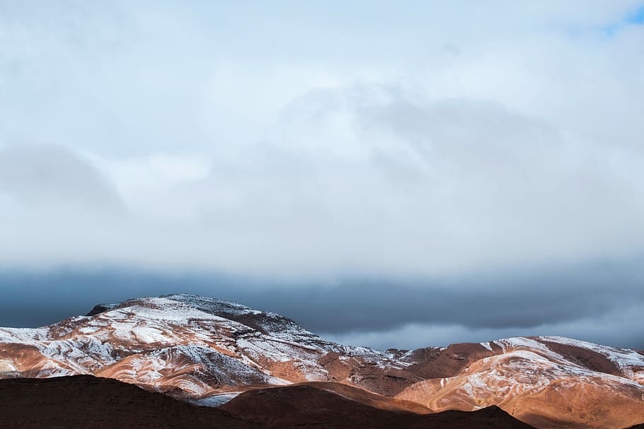 landscape photography of brown and white mountains, photo of glacier mountains under white clouds HD wallpaper