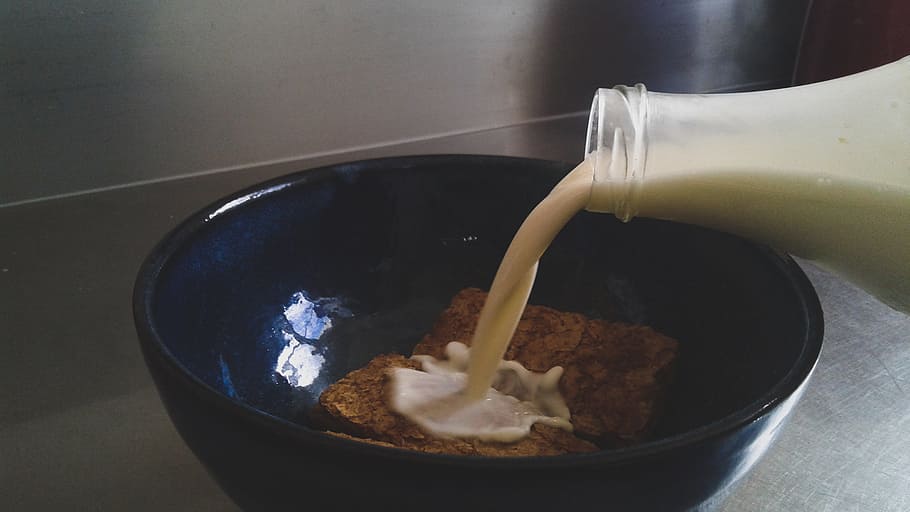 Milk Being Poured in Blue Ceramic Bowl With Cookies, biscuits HD wallpaper