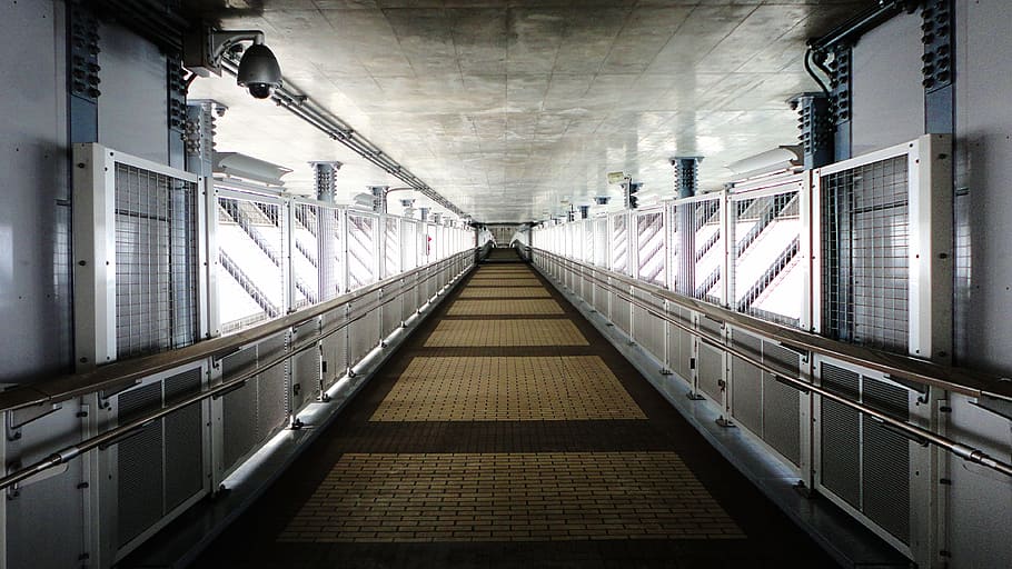 aisle, perspective, security, concrete, steel frame, natural light HD wallpaper