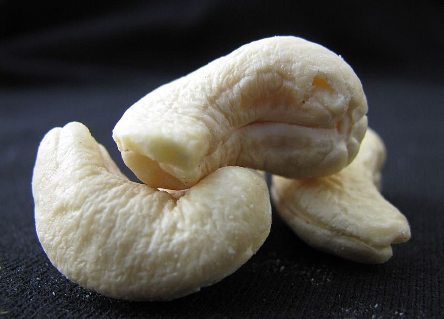 three cashew nuts on black textile, White, Seeds, Healthy, snack