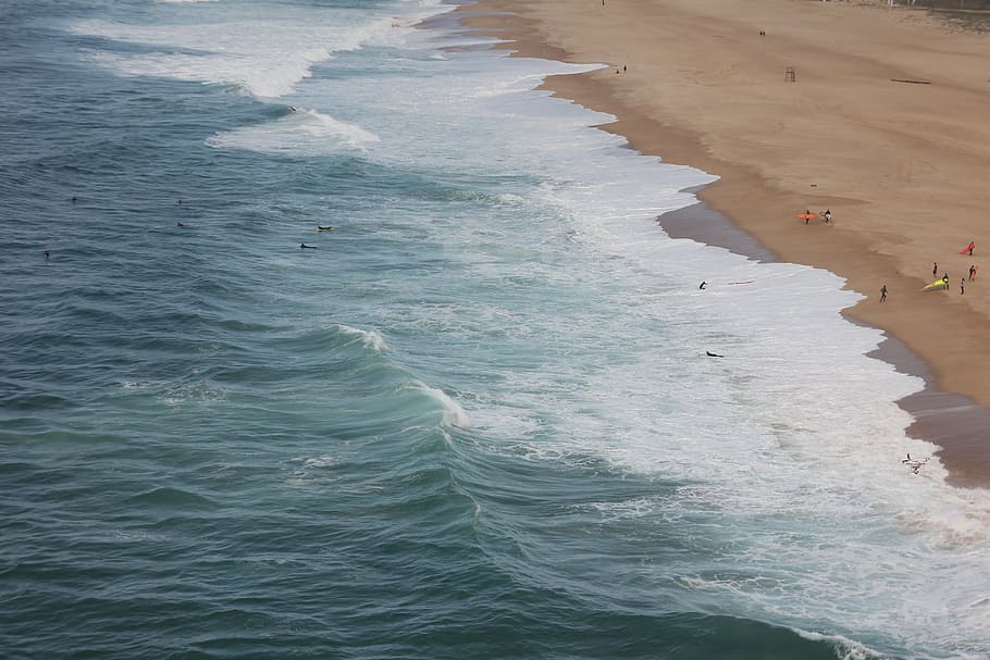 sea, water, ocean, waves, beach, shore, people, men, swimming HD wallpaper