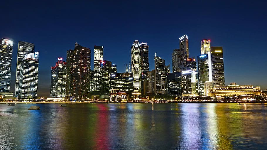 cityscape by water during nighttime, urban Skyline, skyscraper HD wallpaper