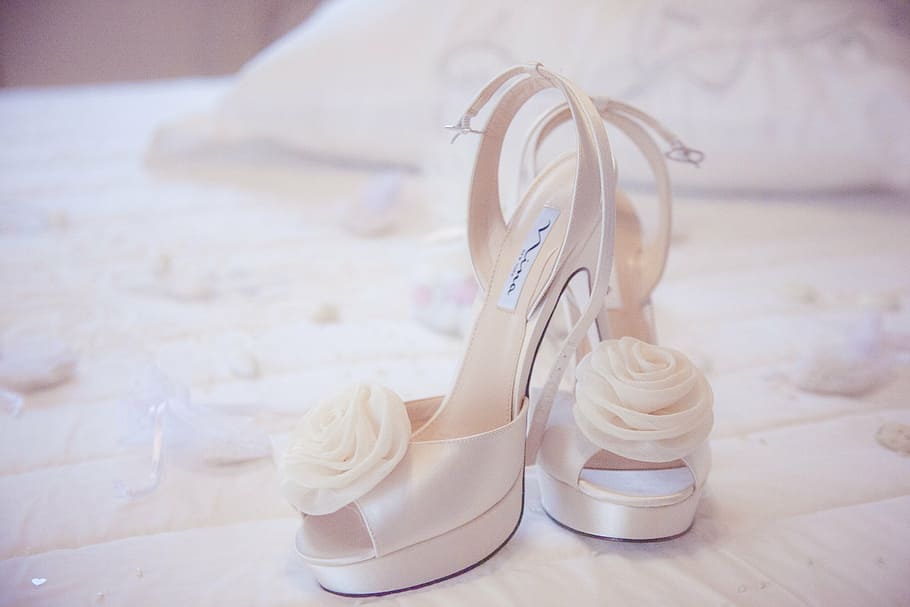 pair of white peep-toe slingback pumps, shoes, wedding dresses