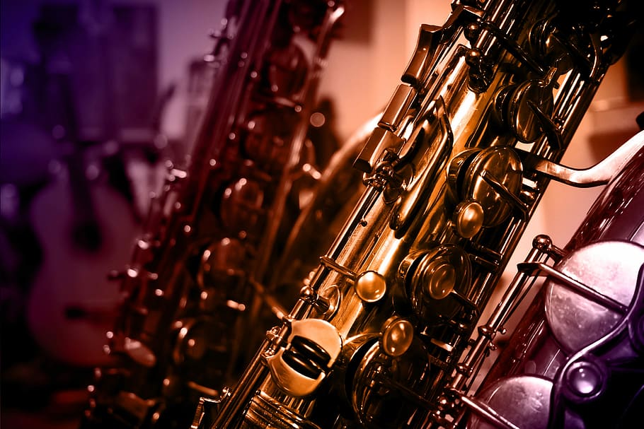 close-up of brass-colored saxophone, instrument, music, design
