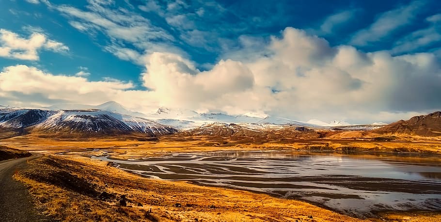 landscape photo of mountain under white clouds at daytime, Iceland HD wallpaper