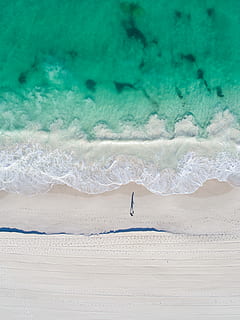 bird's eye view of body of water, aerial photo of person walking on beach during daytime HD wallpaper
