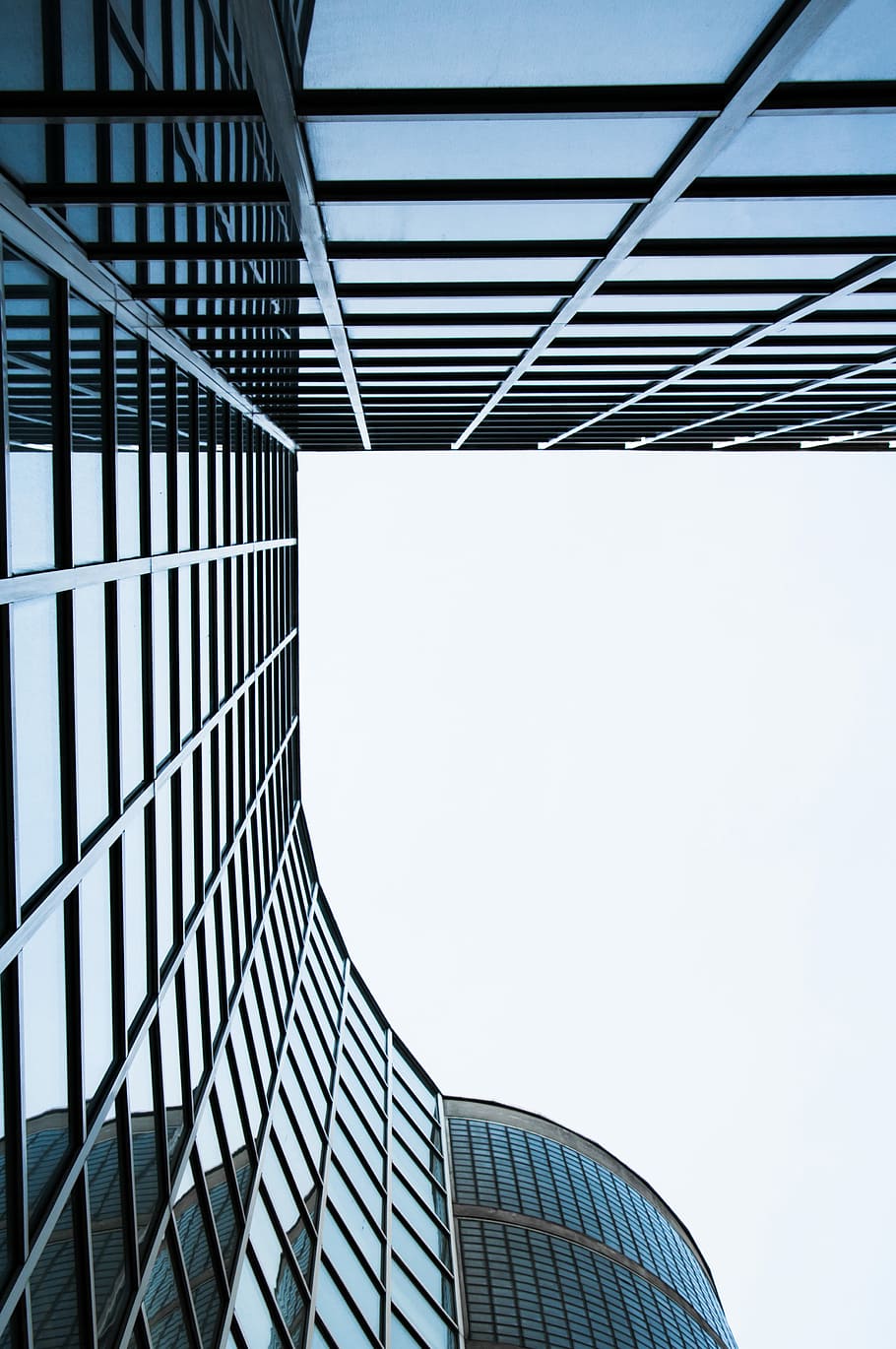 blue concrete building during day time, photo of curtain wall building HD wallpaper