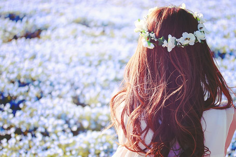 woman wearing white flower wreath beside blooming white flower field during daytime HD wallpaper