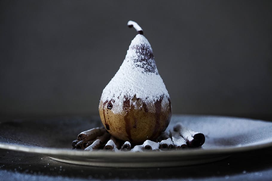 brown peach on brown plate, selective focus photography of truffles on plate HD wallpaper