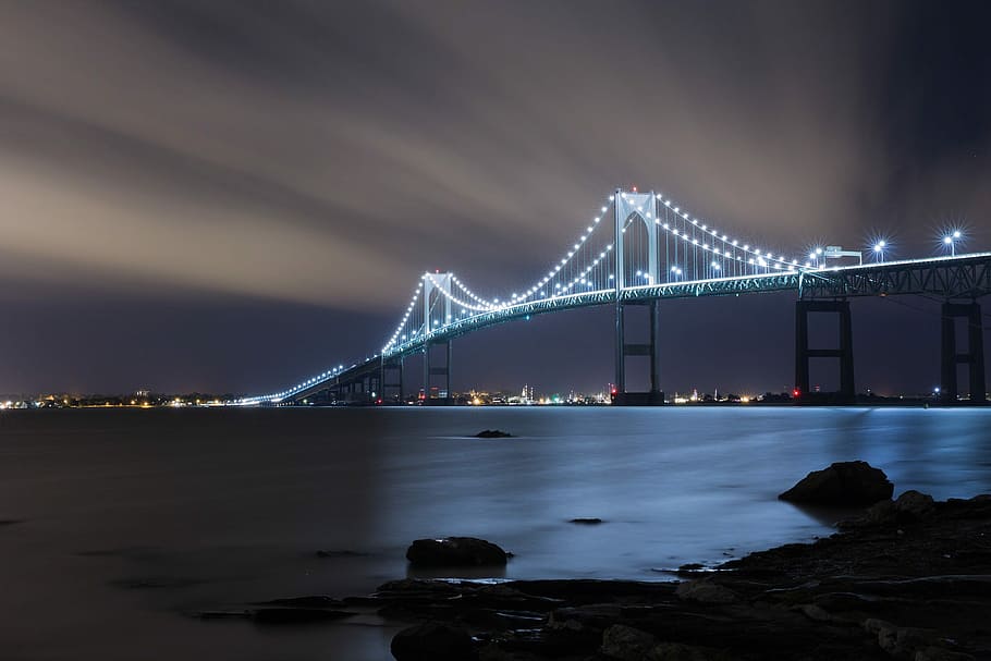 Golden Bridge during night, cable bridge with lights at night time