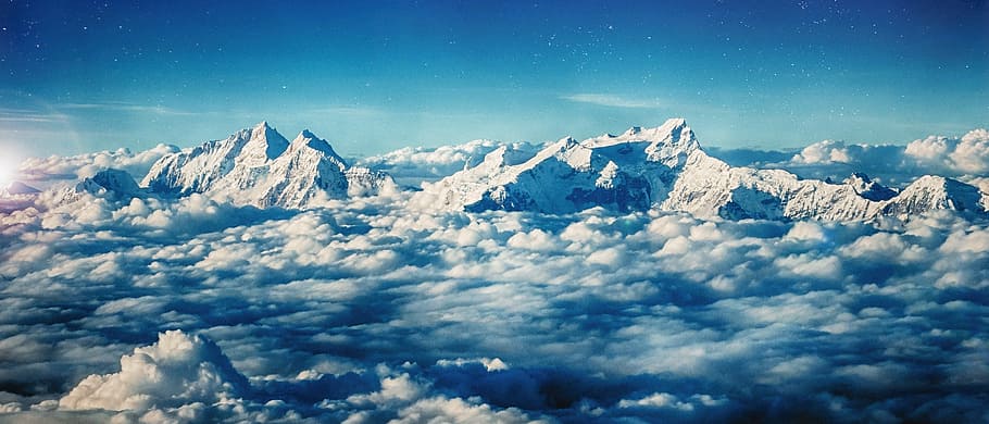 clouds on mountain, person showing snowy mountain, mountain range HD wallpaper