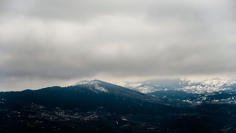 black rocky mountain under white cloudy sky during daytime, mountain peak during daytime HD wallpaper