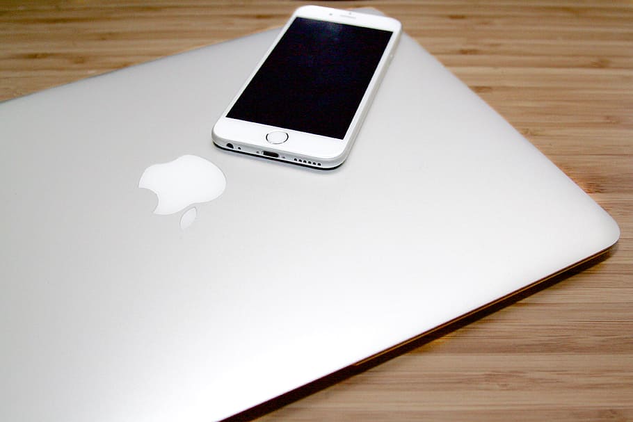 silver iPhone 5s on silver MacBook, desk, smart, apple, technology