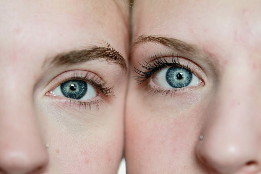 photo of woman's face reflection, two people's eyes in close-up photography HD wallpaper