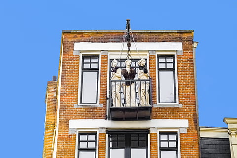 building, brick, balcony, statue, sculpture, women, amsterdam HD wallpaper