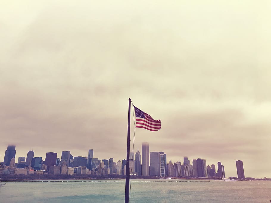 American flag, U.S.A. flag, city, cloud, cloudy, water, building exterior HD wallpaper
