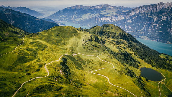 mountain with green grass and tree aerial photography, green mountain HD wallpaper