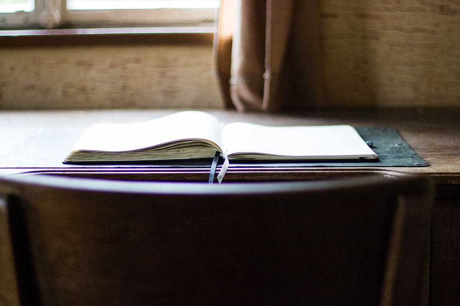 open book on brown wooden table, opened book on table near window HD wallpaper