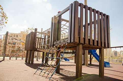 brown wooden playground, fun, sunlight, outdoors, sky, architecture HD wallpaper