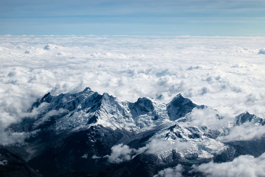 aerial photography of snowy mountain, aerial photo of snow covered mountain and sea of clouds during daytime HD wallpaper