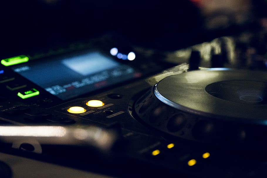 HD wallpaper: selective focus photography of turned on DJ controller